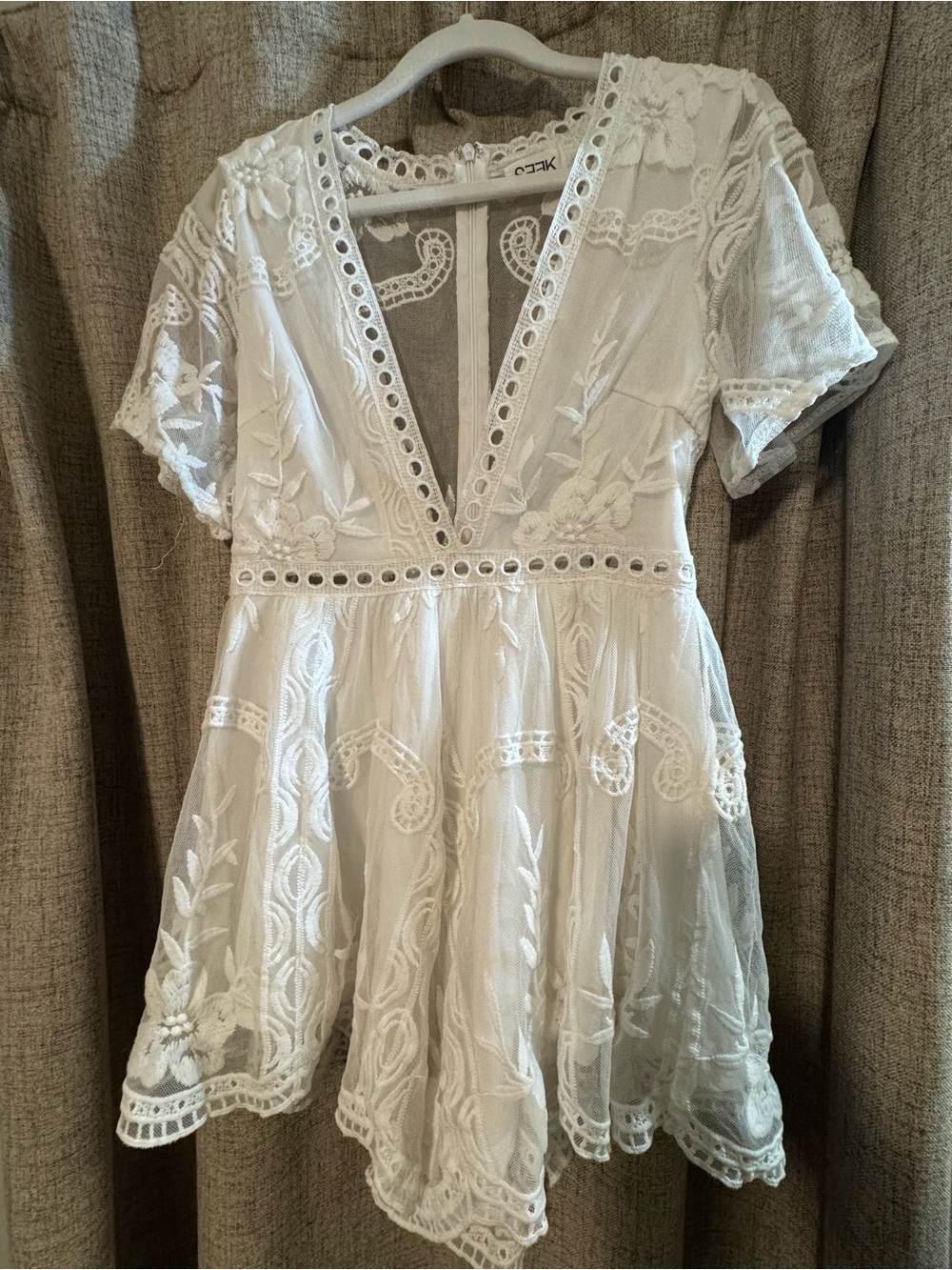 White Embroidered Deep V Romper with Eyelet Waist Detail